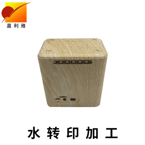 西乡水转印技术助力木纹音箱升级 水披覆转印工艺与全流程技术服务解析